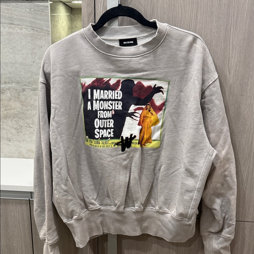 We11done Heat-Reactive “I Married a Monster” Sweatshirt
